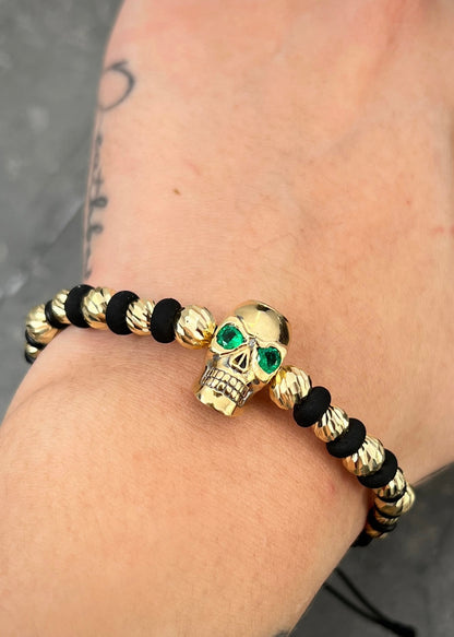 Pulsera en hilo negro con herraje calavera 9.75gr / Oro Amarillo (Joya) M