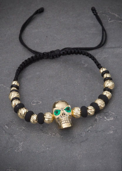 Pulsera en hilo negro con herraje calavera 9.75gr / Oro Amarillo (Joya) M