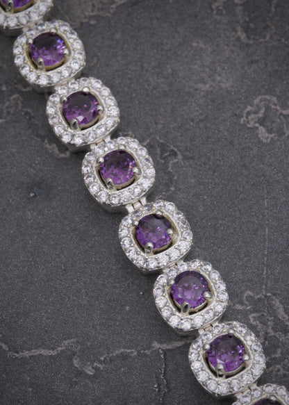 Pulso tenis con swarovski morado y blanco 24gr / Largo 19.5cm / Plata B