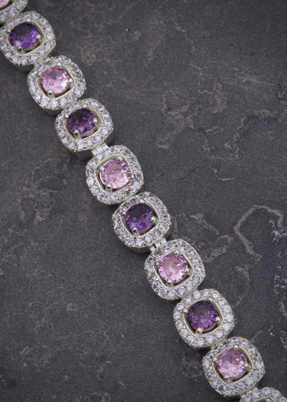 Pulso tenis con swarovski rosado y morado 22.5gr / Largo 18cm / Plata P