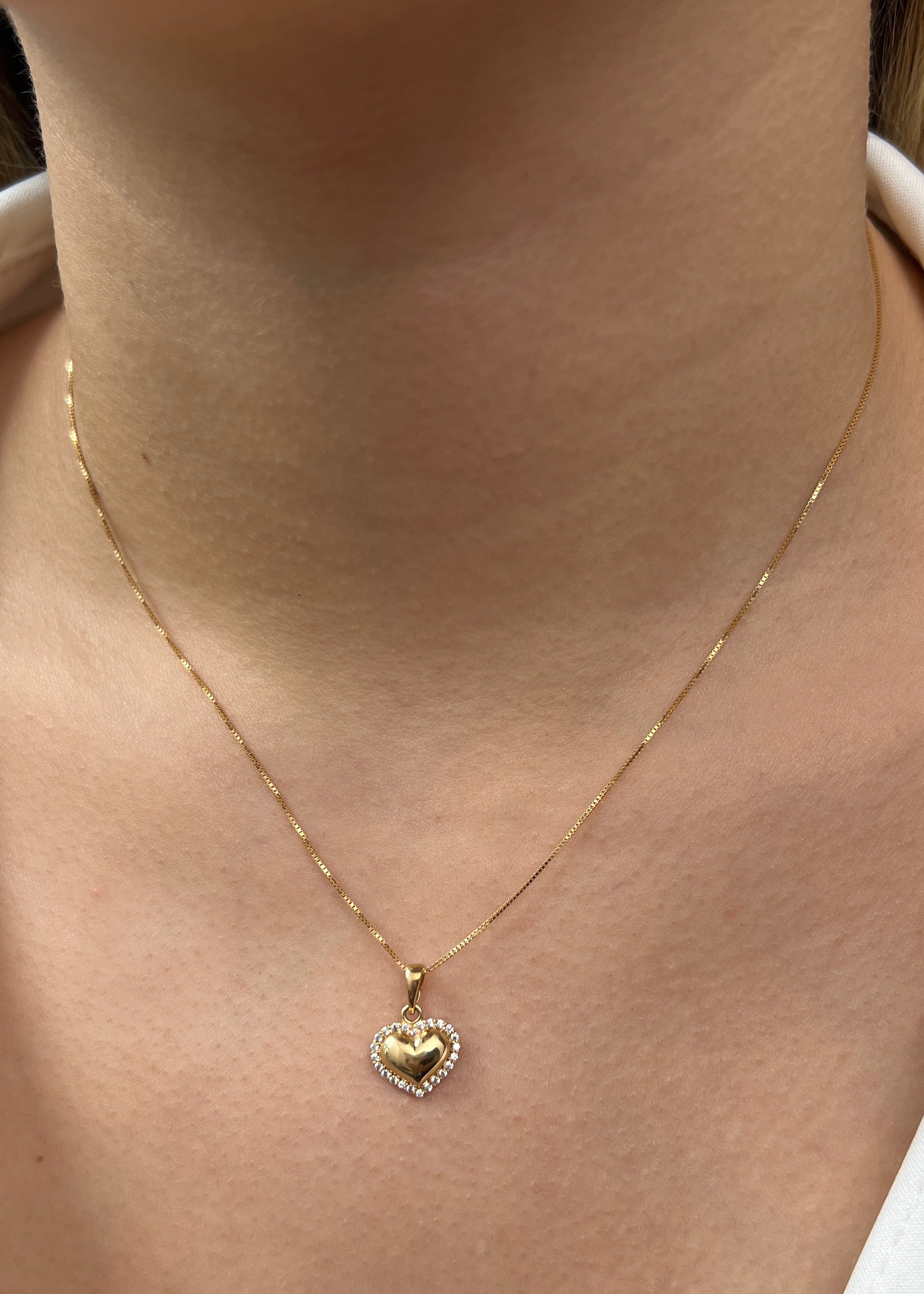 Dije Corazon con swarovski blanco 1.3gr / Largo 1.6cm / Oro Amarillo Nac M