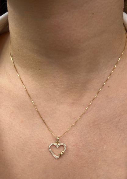 Dije corazon con swarovski blanco 1.25gr / Largo 1.8cm / Oro Amarillo Nac M