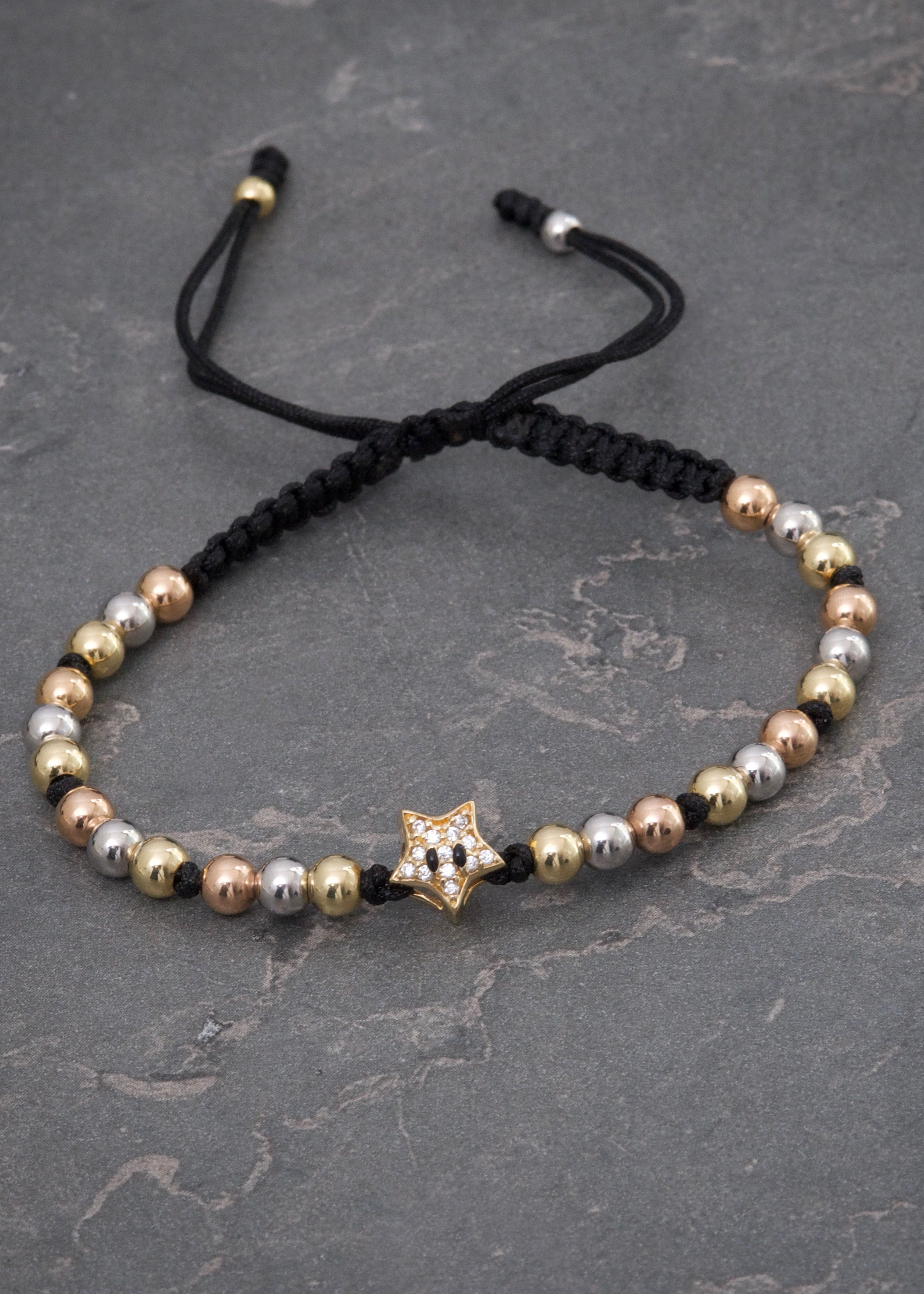 Pulsera en hilo negro con herraje de estrella 2.85gr / Tres Oros (Joya) M