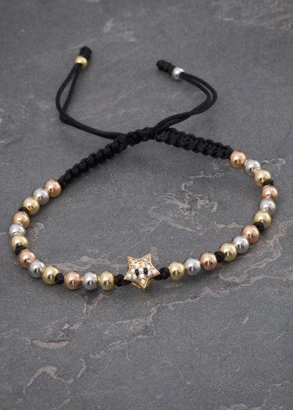 Pulsera en hilo negro con herraje de estrella 2.85gr / Tres Oros (Joya) M