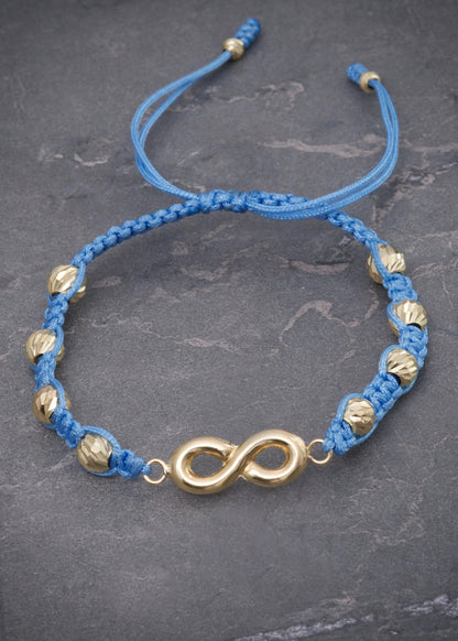 Pulsera en hilo azul con herraje de infinito 1.75gr / Oro Amarillo (Joya) M