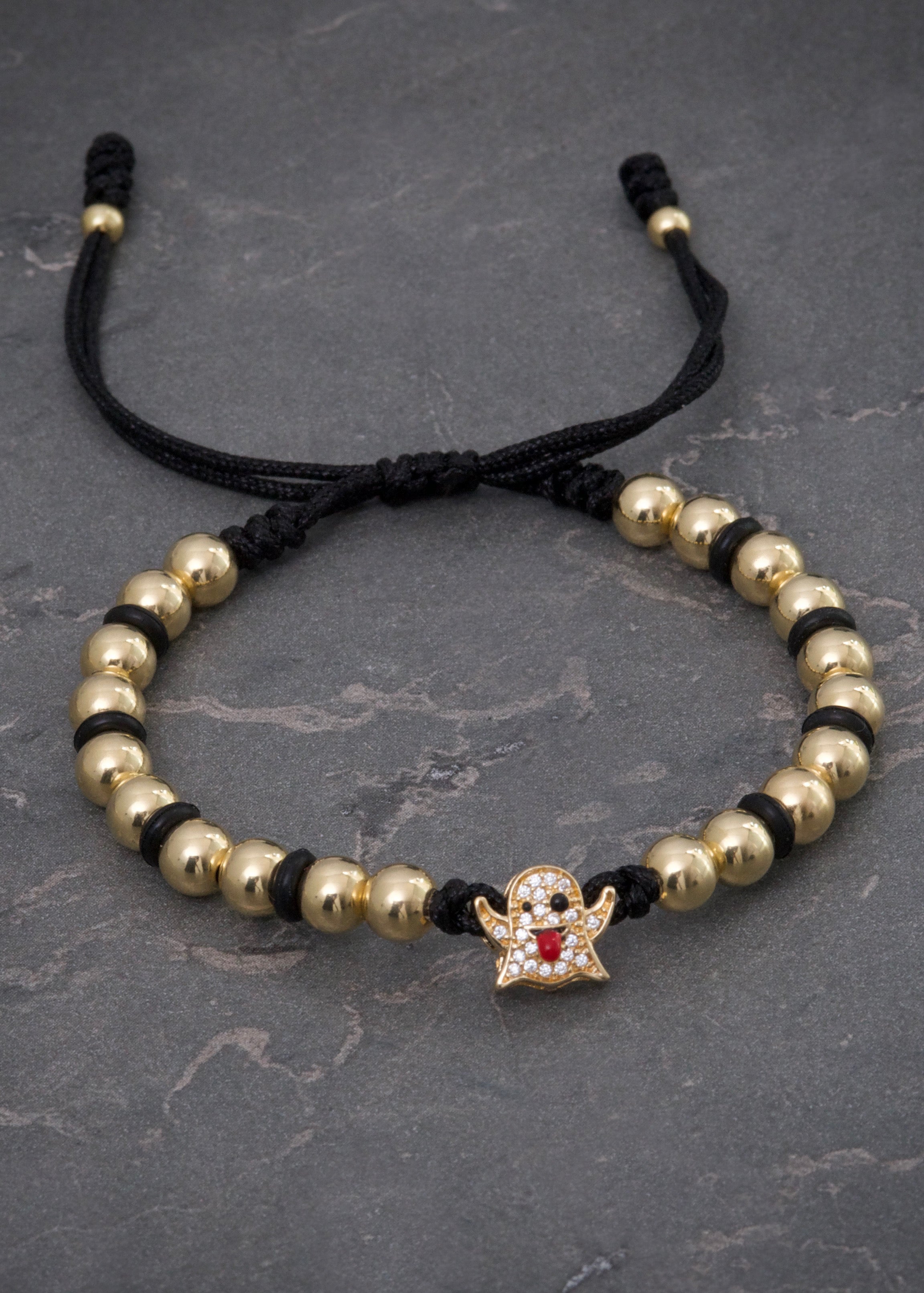 Pulsera en hilo negro con herraje de fantasma 3.67gr / Oro Amarillo (Joya) M