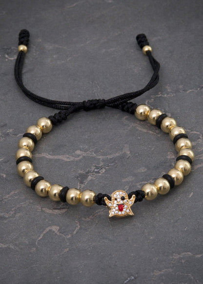 Pulsera en hilo negro con herraje de fantasma 3.67gr / Oro Amarillo (Joya) M