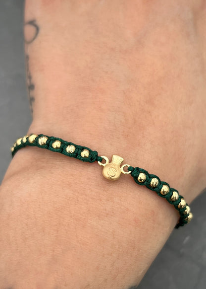Pulsera en hilo verde con herraje bolsa de dinero 1.61gr / Oro Amarillo (Joya) M
