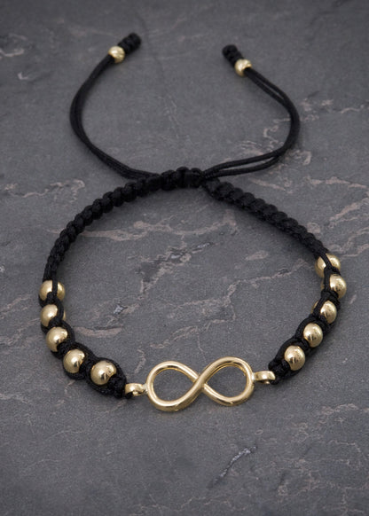 Pulsera en hilo negro con herraje de infinito 1.33gr / Oro Amarillo (Joya) M