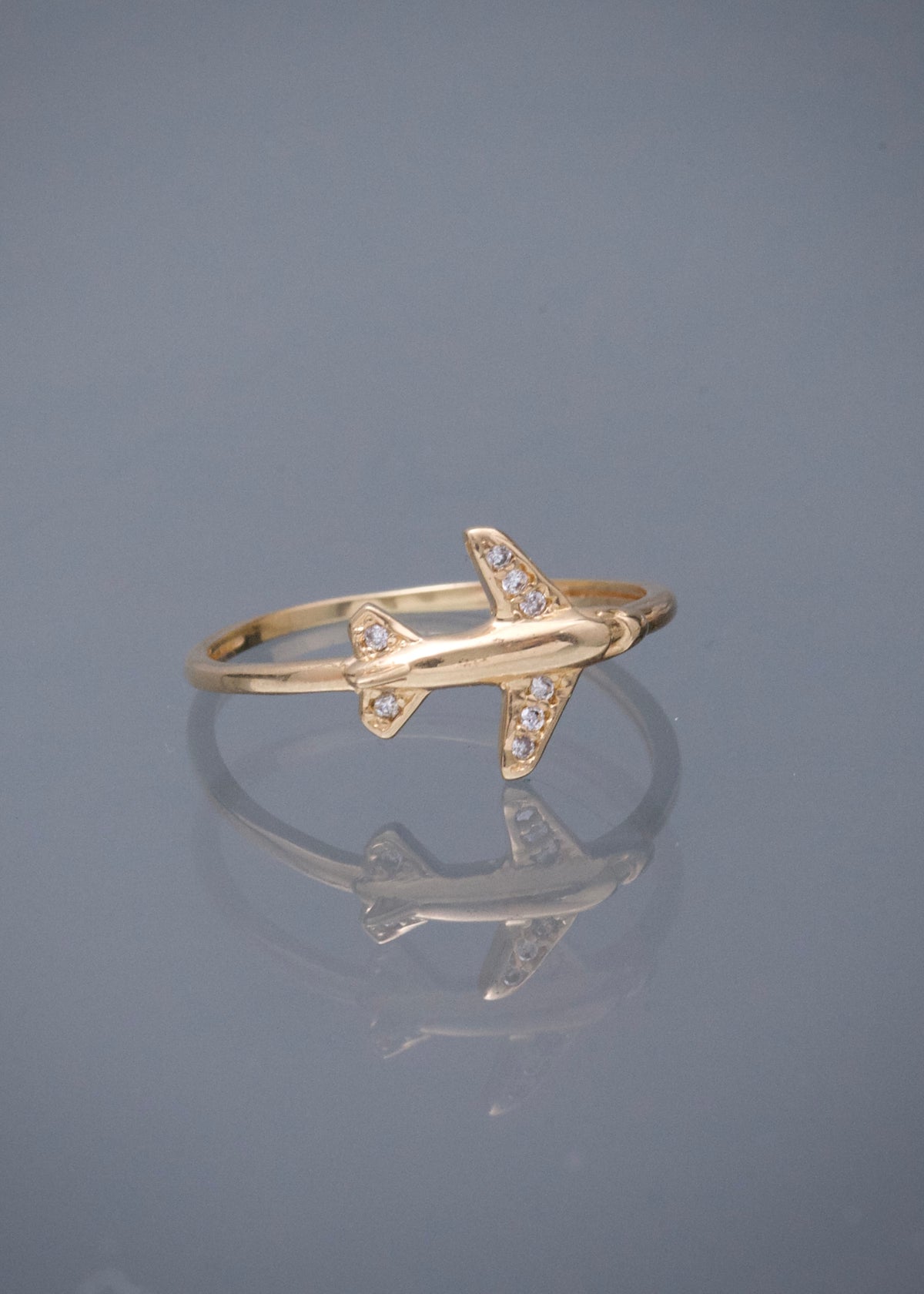 Anillo Avion con Swarovski Blanco 1.65gr / Talla 7 1/4 — Oro Amarillo
