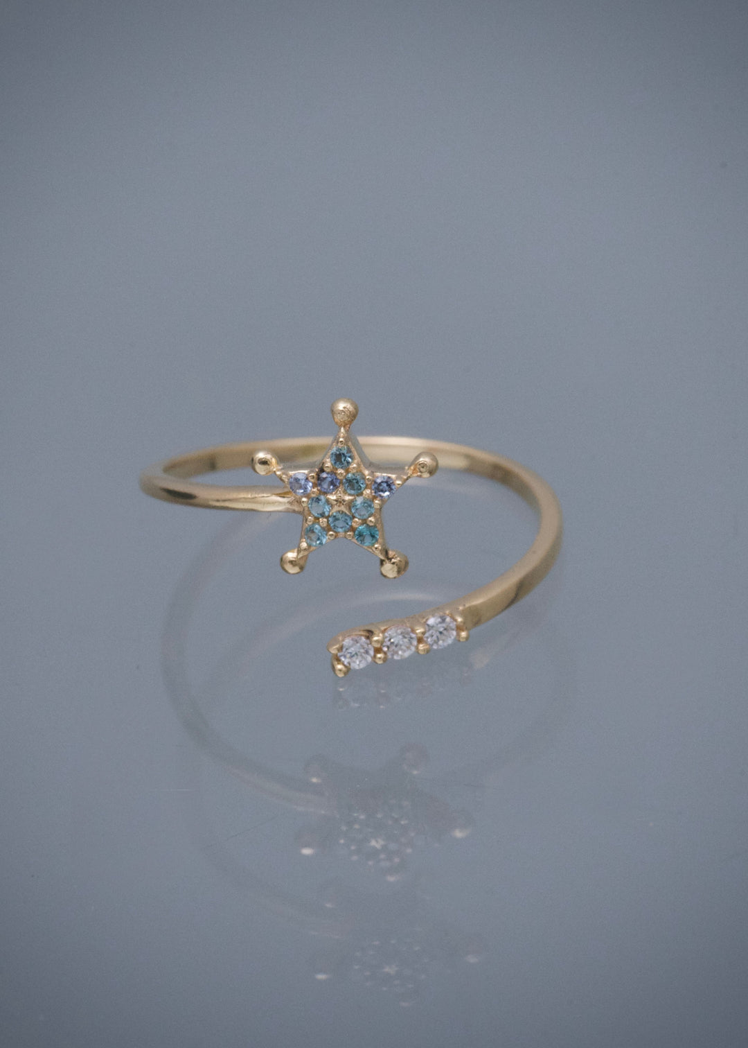 Anillo Estrella con Swarovski Azul y Blanco 1.3gr / Talla 6 — Oro Amarillo