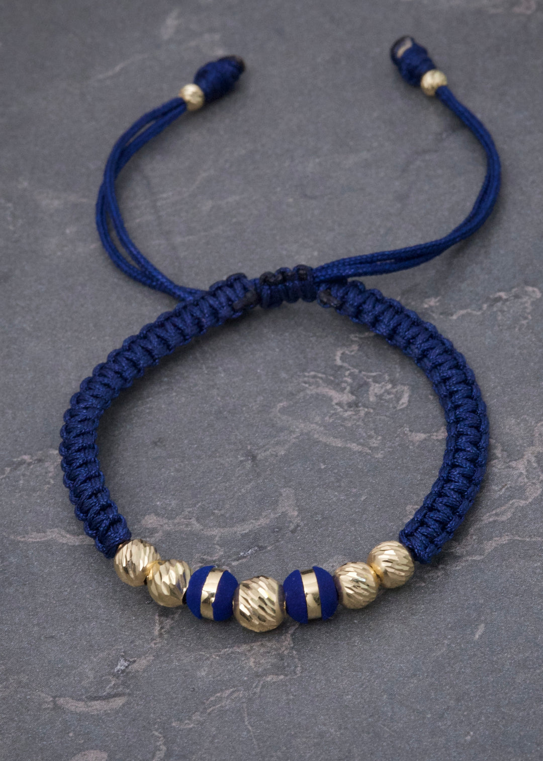 Pulsera en Hilo Azul con Bolas Diamantadas y Neoros 0.8gr — Oro Amarillo