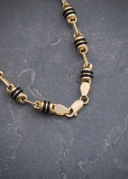 Cadena Rustica Caucho Negro 15.15gr / 60cm / 4.4mm — Oro Amarillo