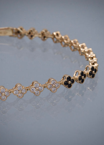 Pulso Flor con Swarovski Blanco y Negro 12.25gr / 19c.5m / 6mm — Oro Amarillo