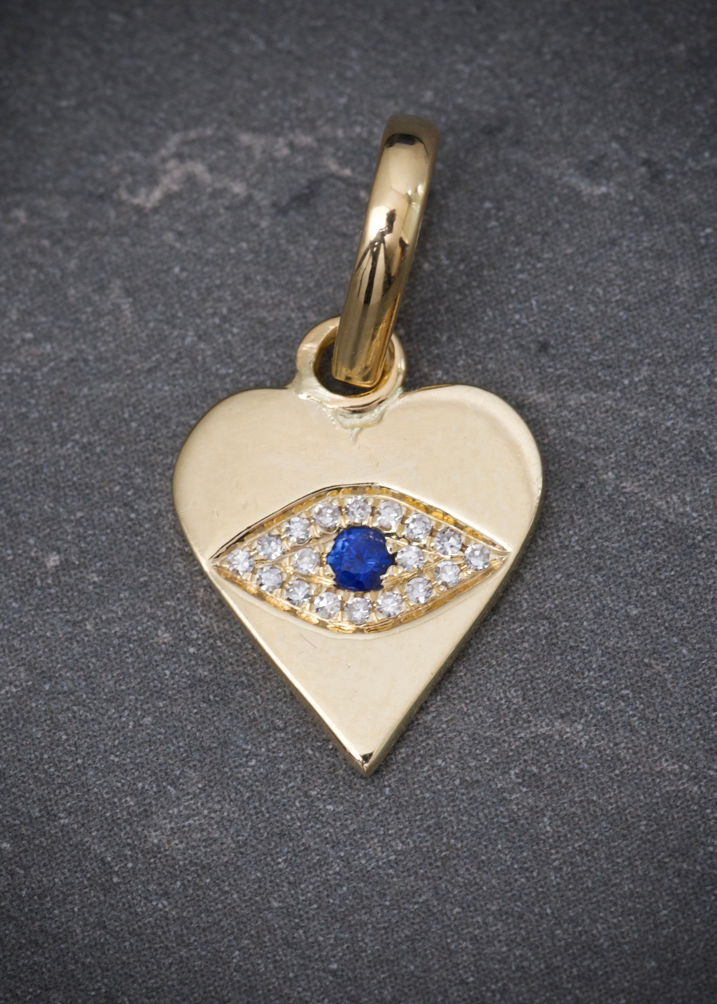 Dije corazon con swarovski blanco y azul 1.5gr / Largo 1.9cm / Oro Amarillo 14k P