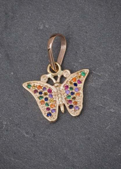 Dije mariposa con swarovski multicolor 1.9gr / Largo 2cm / Oro Amarillo Nac B