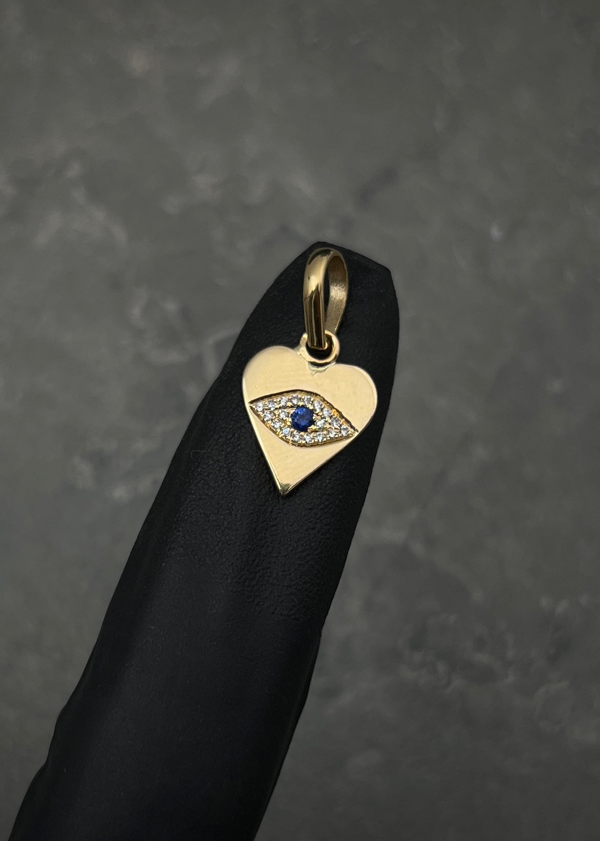 Dije corazon con swarovski blanco y azul 1.5gr / Largo 1.9cm / Oro Amarillo 14k P