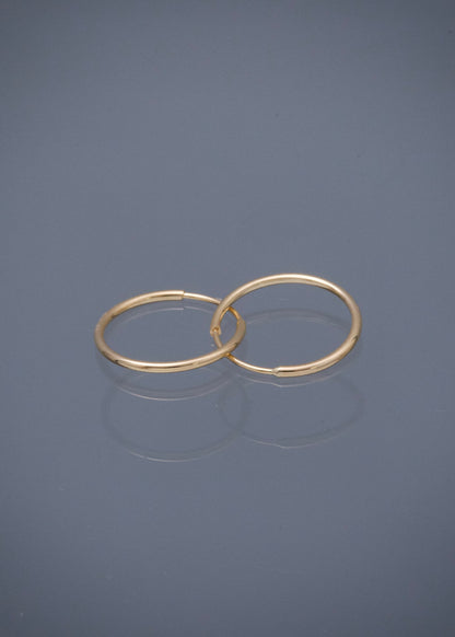Candongas lisas 0.55gr / Largo 1.2cm — Oro Amarillo