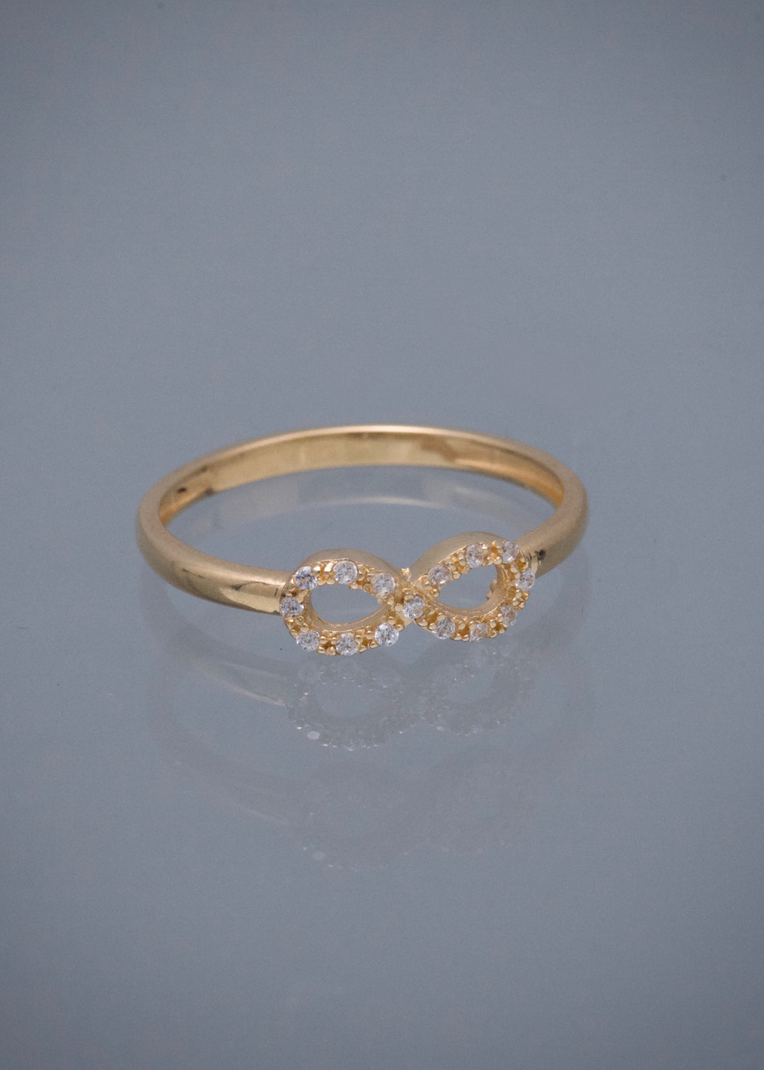 Anillo Infinito con Swarovski Blanco 1.6gr / Talla 6 3/4 — Oro Amarillo