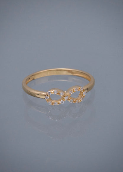 Anillo Infinito con Swarovski Blanco 1.6gr / Talla 6 3/4 — Oro Amarillo