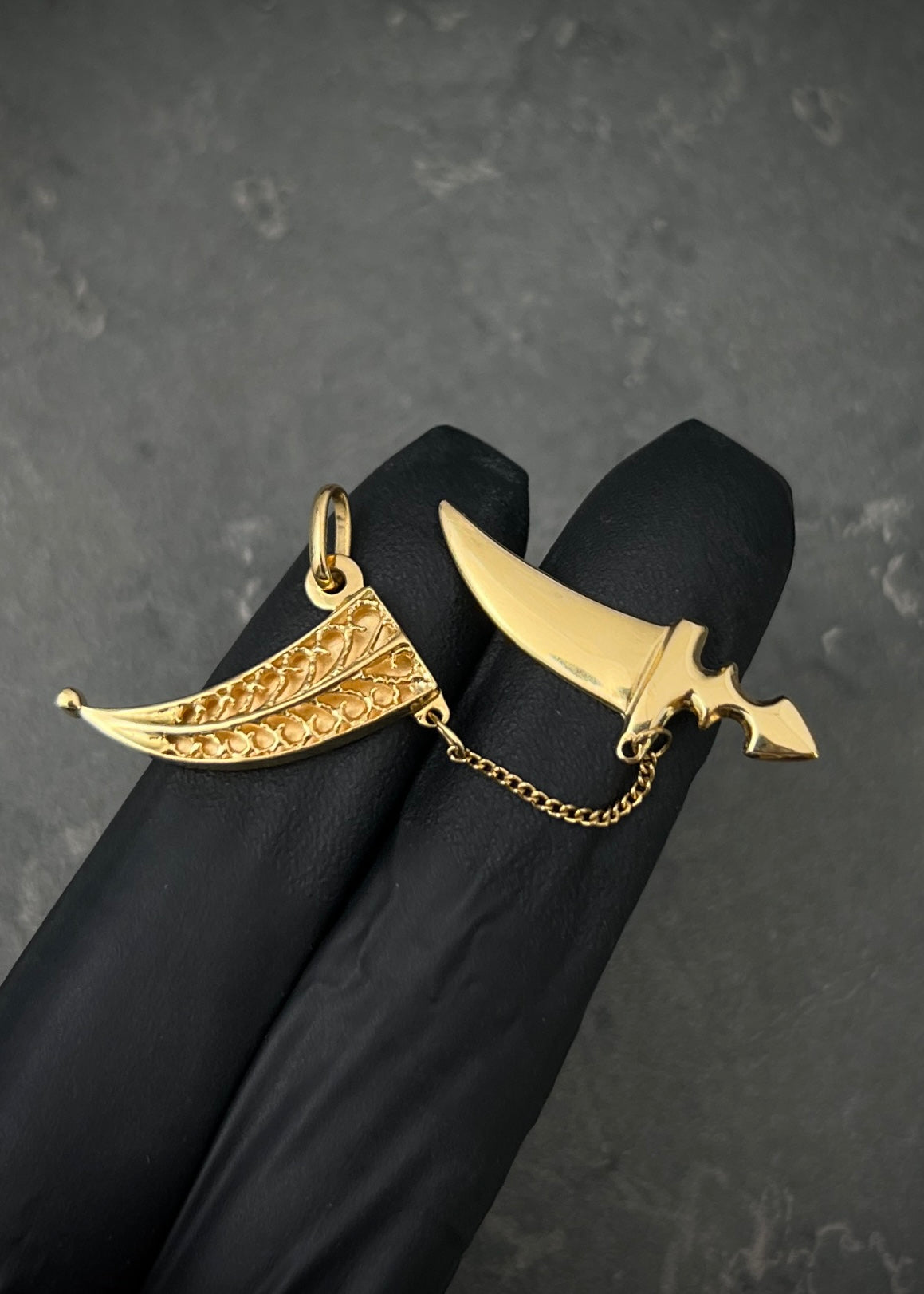 Dije espada 3.6gr / Largo 1.5cm / Oro Amarillo Nac M