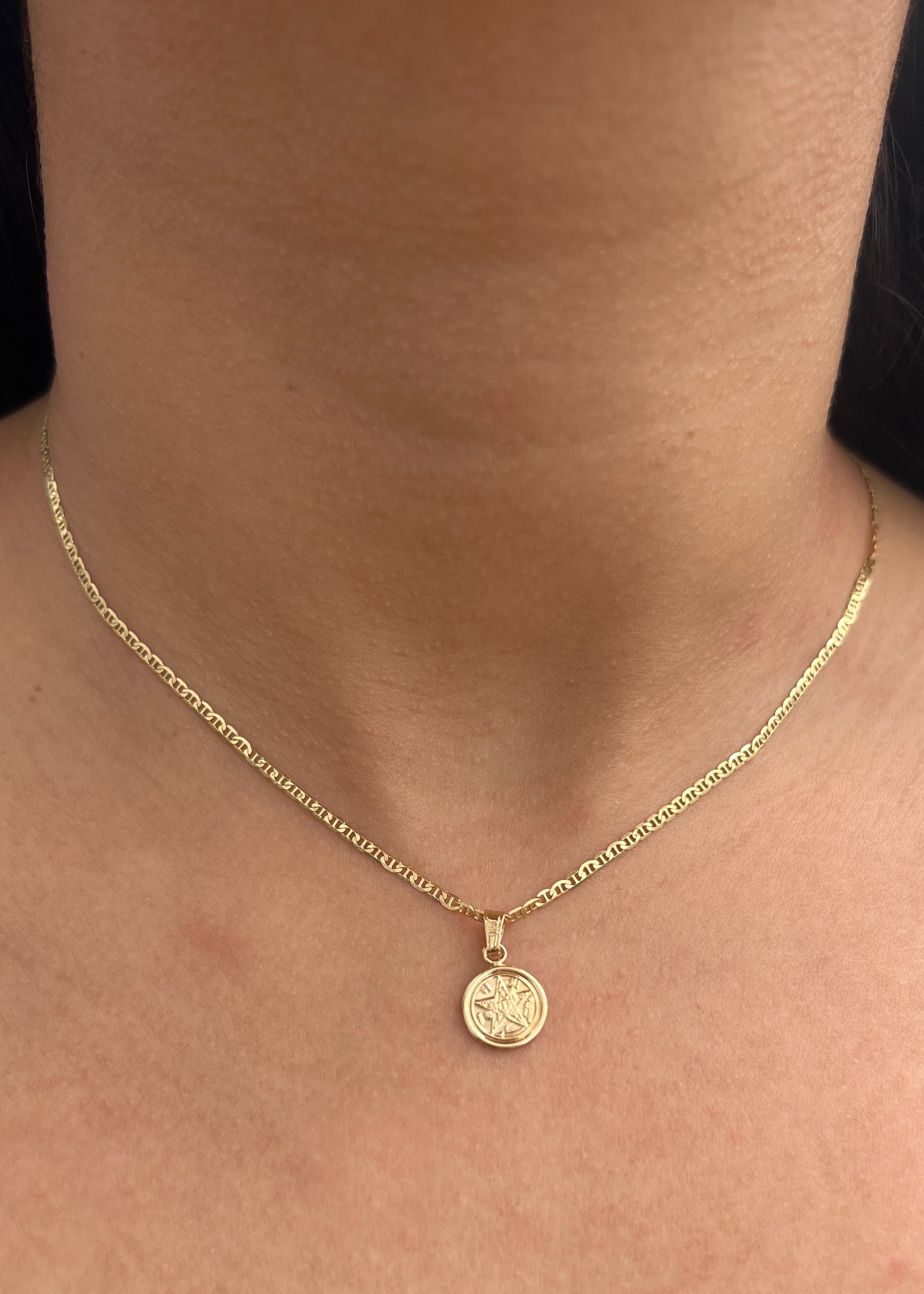 Dije estrella 0.45gr / Largo 1.7cm / Oro Amarillo Nac M