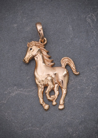 Dije caballo 2.6gr / Largo 3.2cm / Oro Rosado Nac M