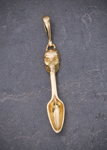 Dije cuchara con calavera 2.05gr / Largo 4cm / Oro Amarillo Nac M