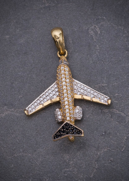 Dije avion con swarovski blanco y negro 5.05gr / Largo 3.6cm / Oro Amarillo Nac M