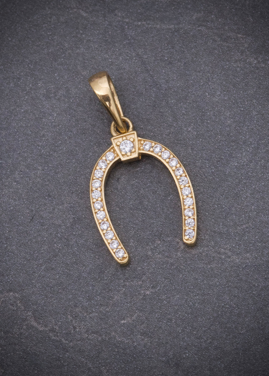 Dije herradura con swarovski blanco 1gr / Largo 2.1cm — Oro Amarillo