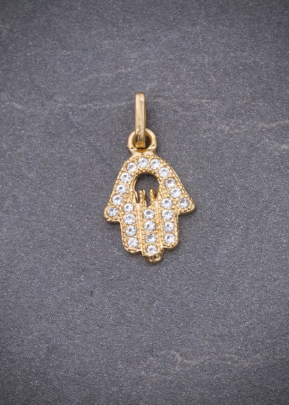 Dije mano hs con swarovski blanco 0.75gr / Largo 1.6cm / Oro Amarillo Nac M