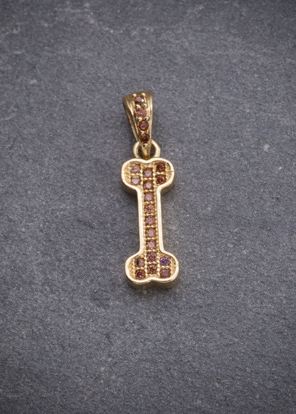 Dije Hueso con Swarovski Cafe 1.15gr / 1.9cm / 5.4mm — Oro Amarillo