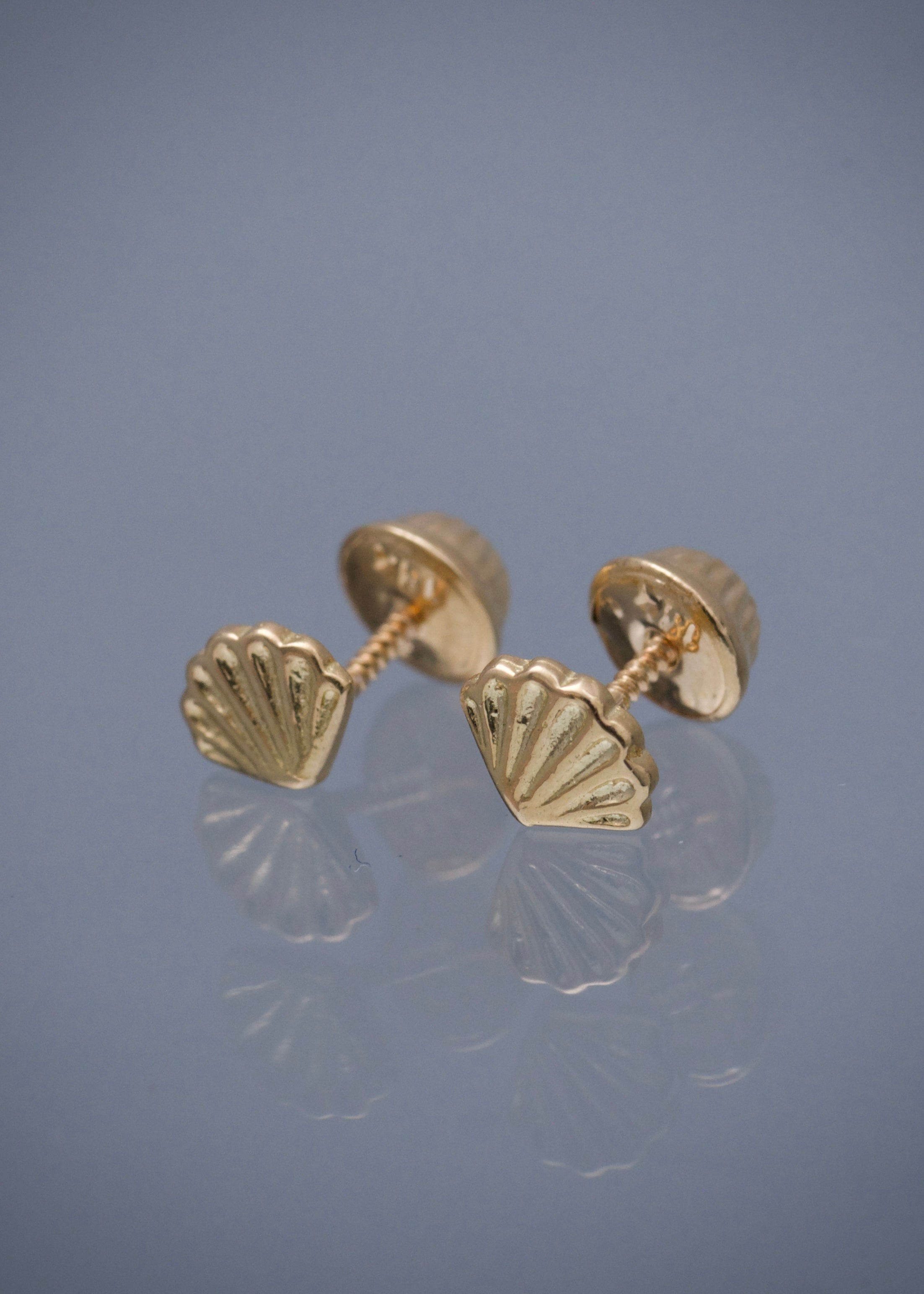 Topos concha 0.9gr / Largo 0.5cm / Oro Amarillo Nac B