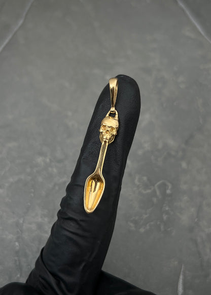Dije cuchara con calavera 2.05gr / Largo 4cm / Oro Amarillo Nac M