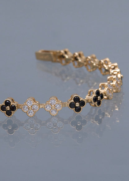 Pulso Flor con Swarovski Blano y Negro 13.2gr / 20.5cm / 6mm — Oro Amarillo