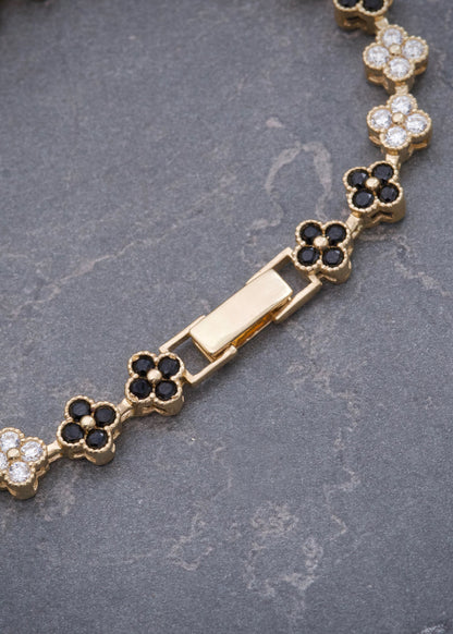 Pulso Flor con Swarovski Blano y Negro 13.2gr / 20.5cm / 6mm — Oro Amarillo