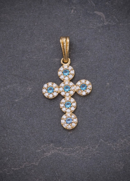 Dije cruz con swarovski azul y blanco 1.5gr / Largo 2.5cm / Oro Amarillo Nac M