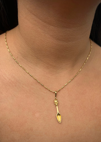 Dije cuchara con calavera 2.05gr / Largo 4cm / Oro Amarillo Nac M