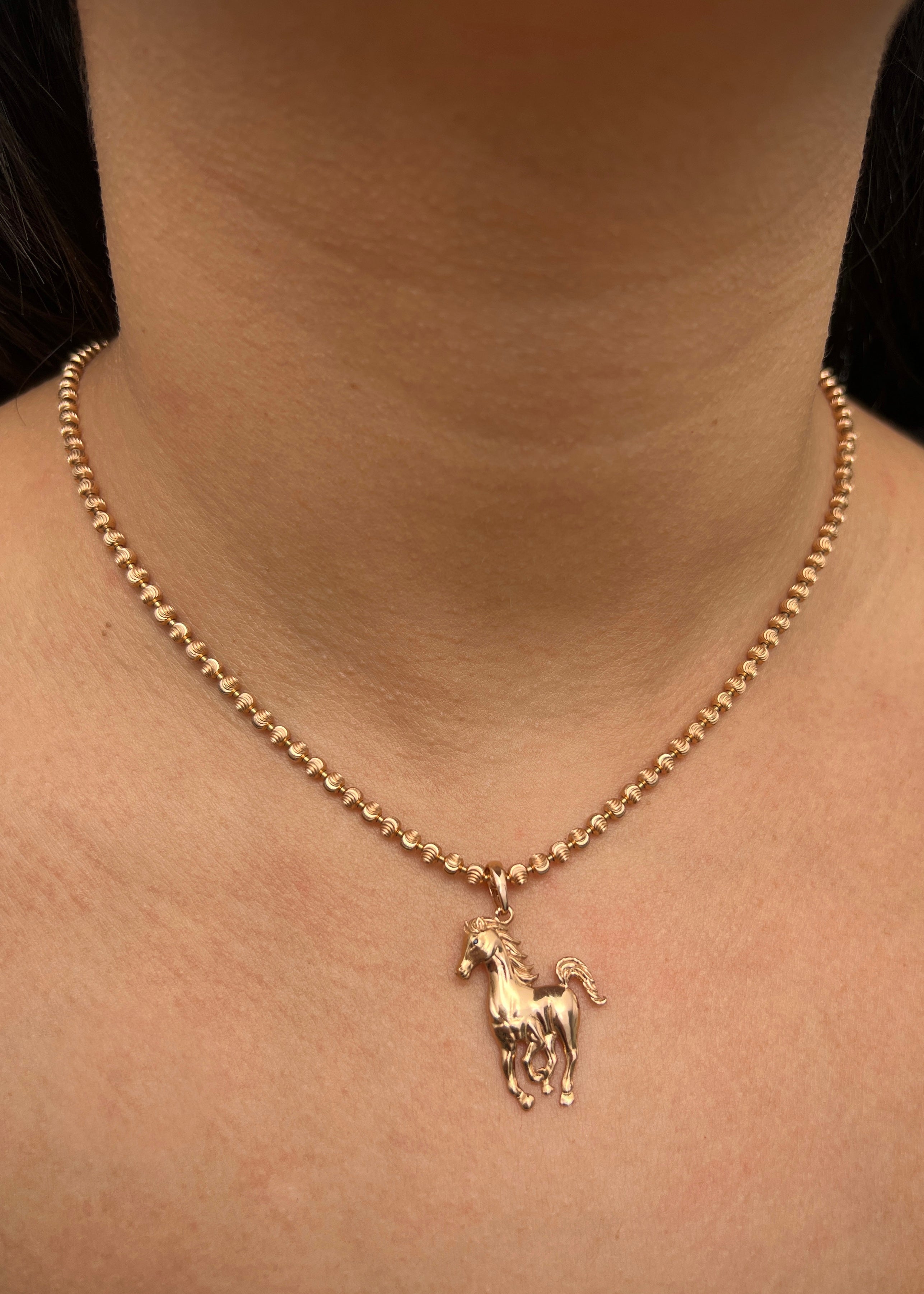 Dije caballo 2.6gr / Largo 3.2cm / Oro Rosado Nac M