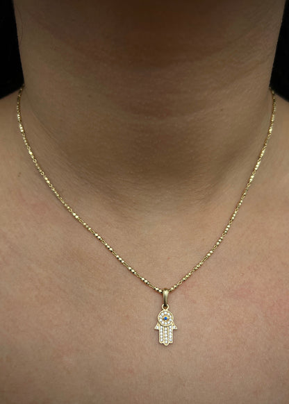 Dije mano hs con swarovski blanco 1.2gr / Largo 2.1cm / Oro Amarillo Nac M