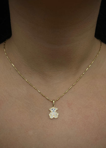 Dije oso th con swarovski blanco y azul 1.6gr / Largo 2.1cm / Oro Amarillo Nac M