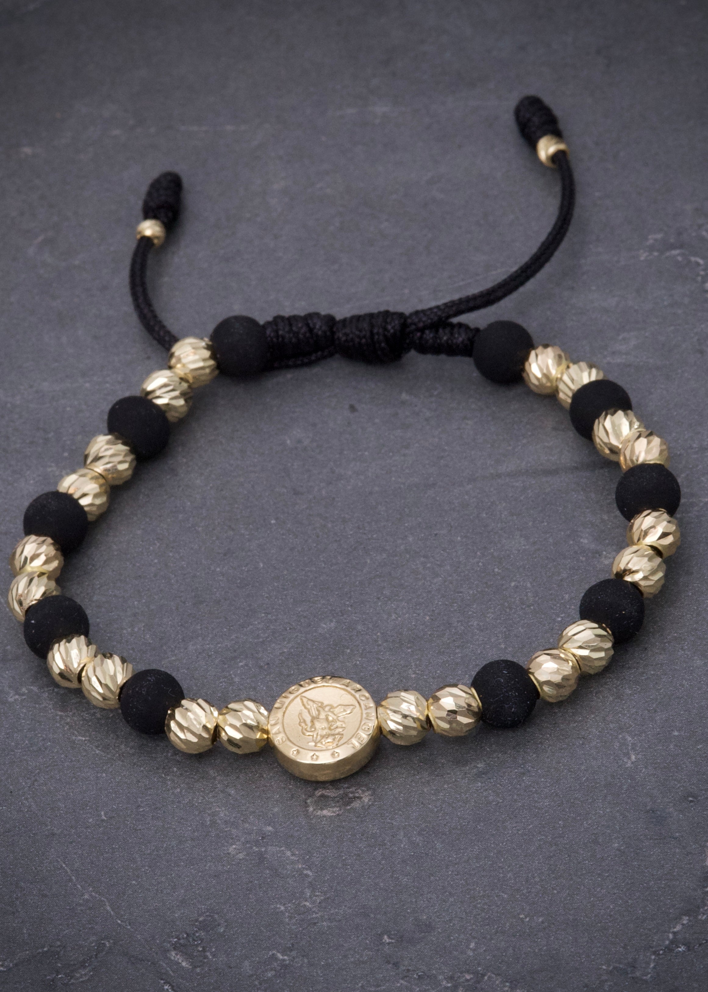 Pulsera en hilo negro con herraje arcangel san miguel 2.9gr / Oro Amarillo (Joya) M