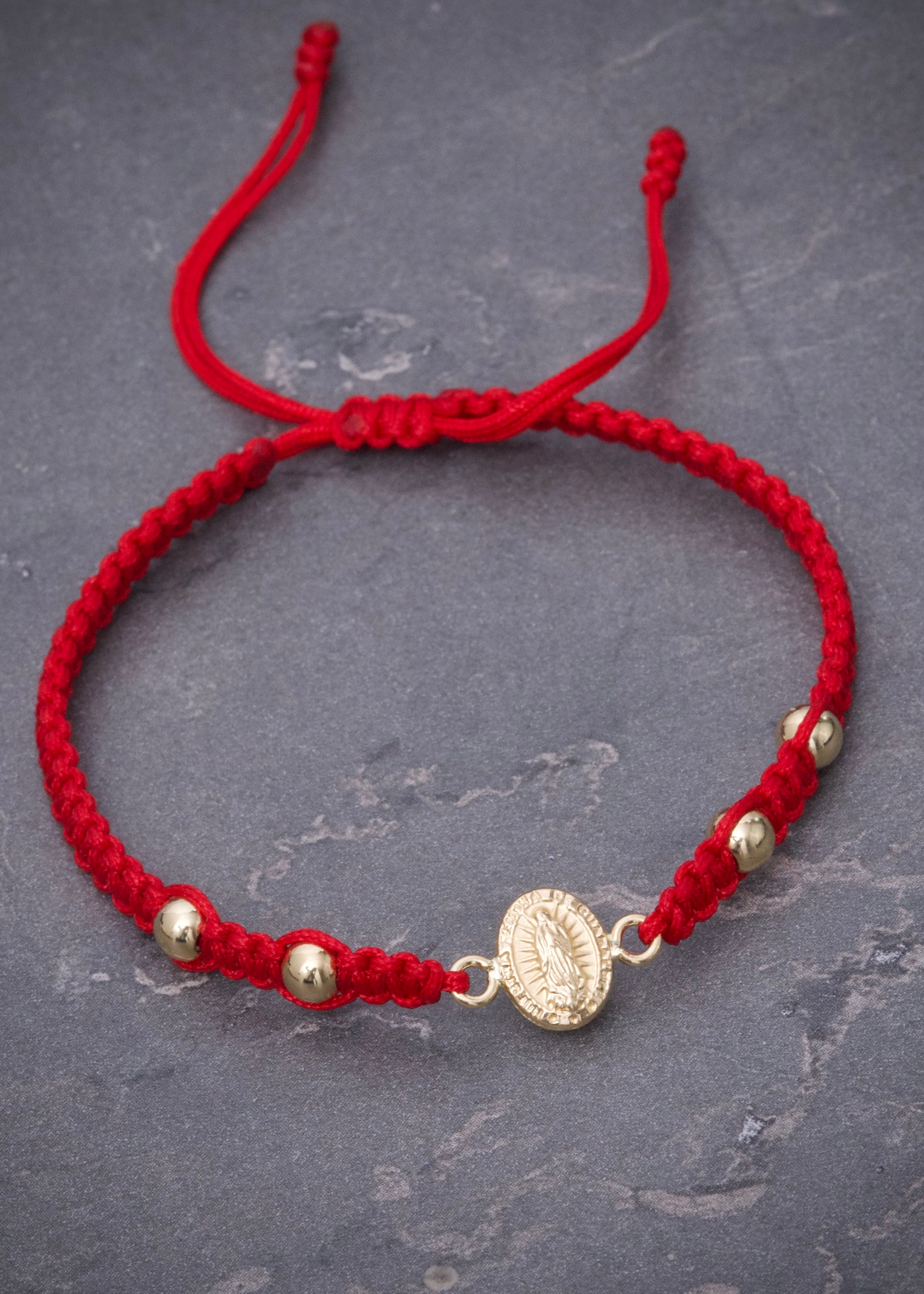 Pulsera en hilo rojo con herraje virgen de guadalupe 0.7gr / Oro Amarillo (Joya) M