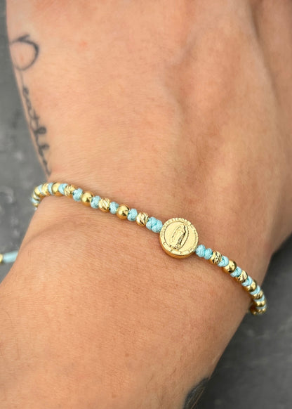 Pulsera en hilo azul con herraje virgen de guadalupe 1.25gr / Oro Amarillo (Joya) M