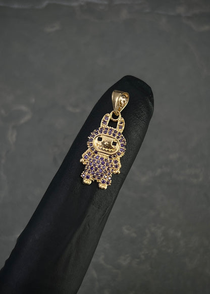 Dije labubu con swarovski morado 1.2gr / Largo 2.1cm / Oro Amarillo Nac B