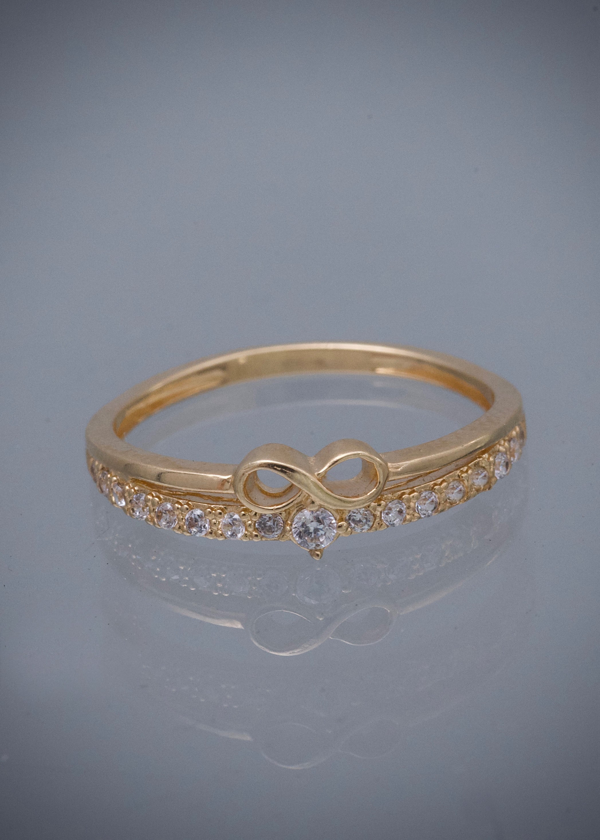 Anillo infinito con swarovski blanco 2.15gr / TALLA 7 1/4 / Oro Amarillo Nac P