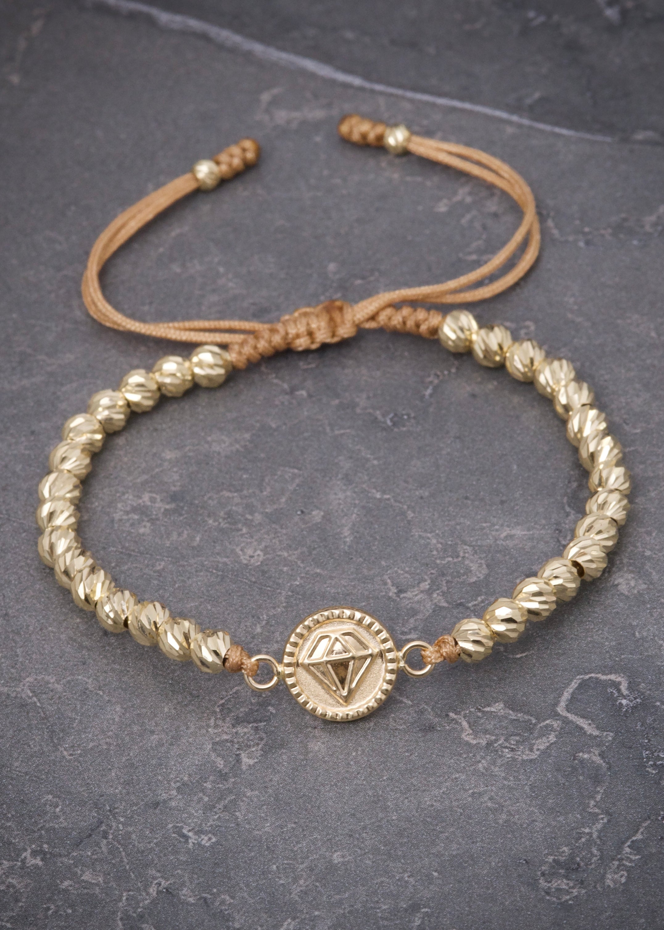 Pulsera en hilo beige con herraje diamante 3.1gr / Oro Amarillo (Joya) P