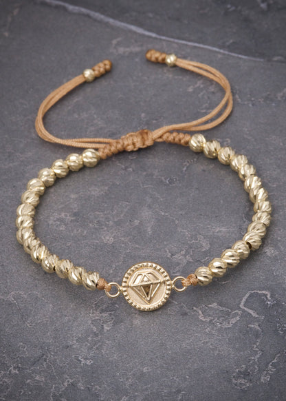 Pulsera en hilo beige con herraje diamante 3.1gr / Oro Amarillo (Joya) P