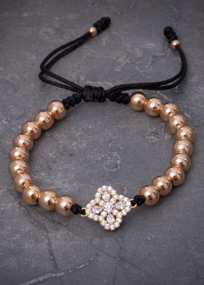 Pulsera en hilo negro con herraje lucky clover 5.66gr / Oro Rosado (Joya) P