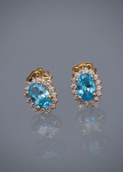 Topos ovalado con swarovski azul y blanco 1.55gr / Largo 0.8cm / Oro Amarillo Nac M